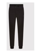 Guess Pantaloni de trening uni -