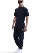 Nike Pantaloni de trening cu buzunare laterale - snur - model uni - Bleumarin