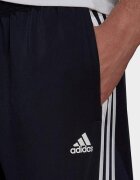 adidas Pantaloni barbati Essentials Warm-Up Tapered 3-Stripes H46106