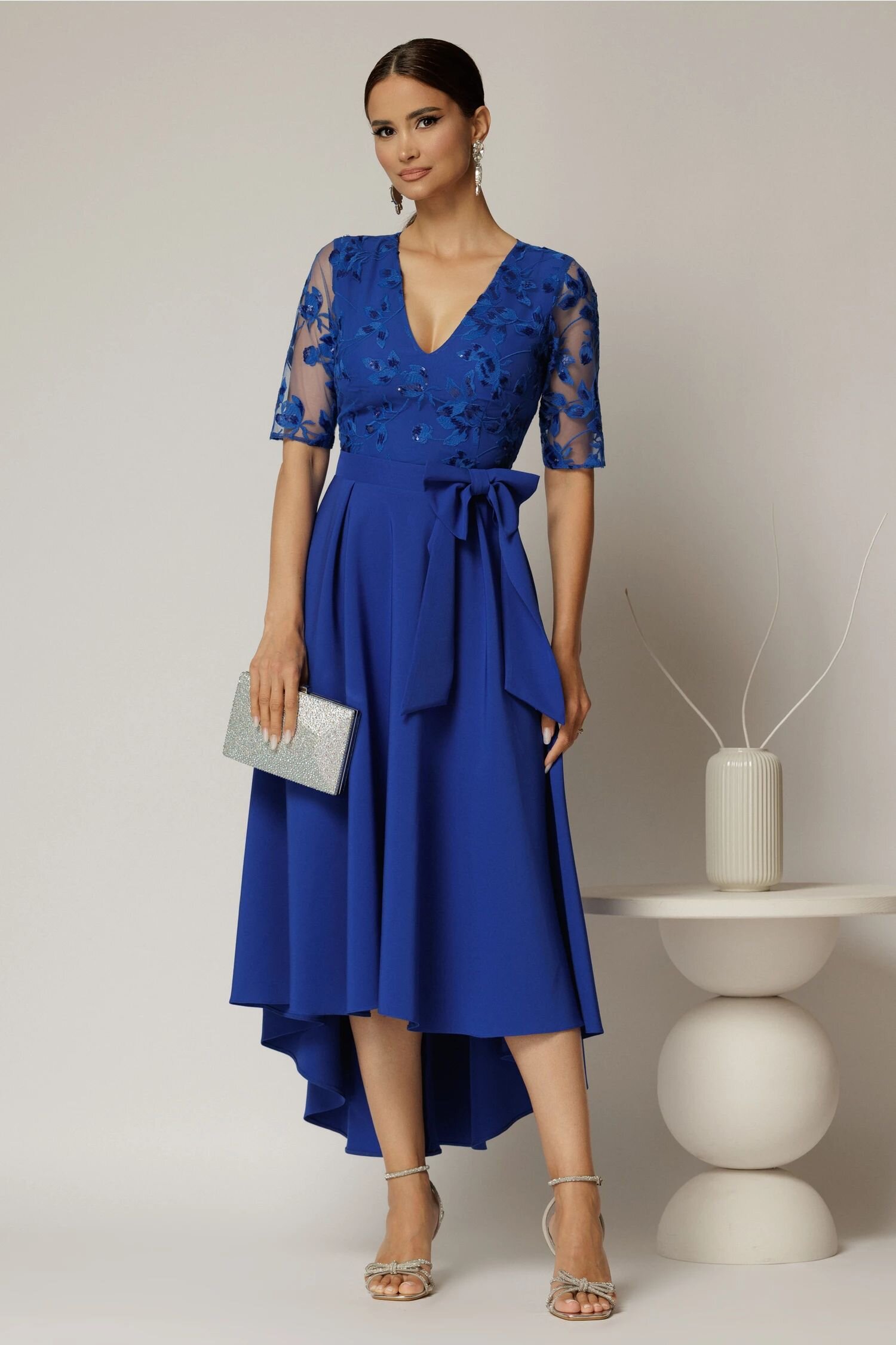  Rochie DY Fashion asimetrica albastra cu dantela cu paiete la bust si funda ampla