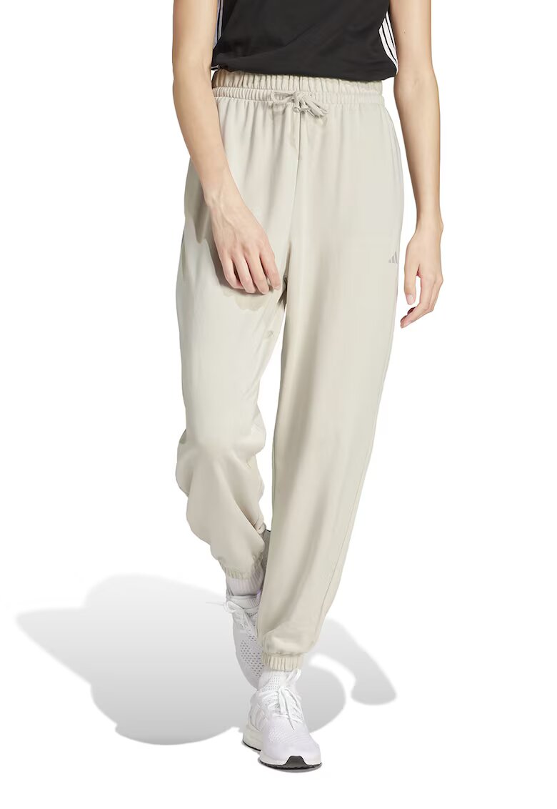 adidas Sportswear Pantaloni de trening cu snur in talie si croiala conica - Alb fildes