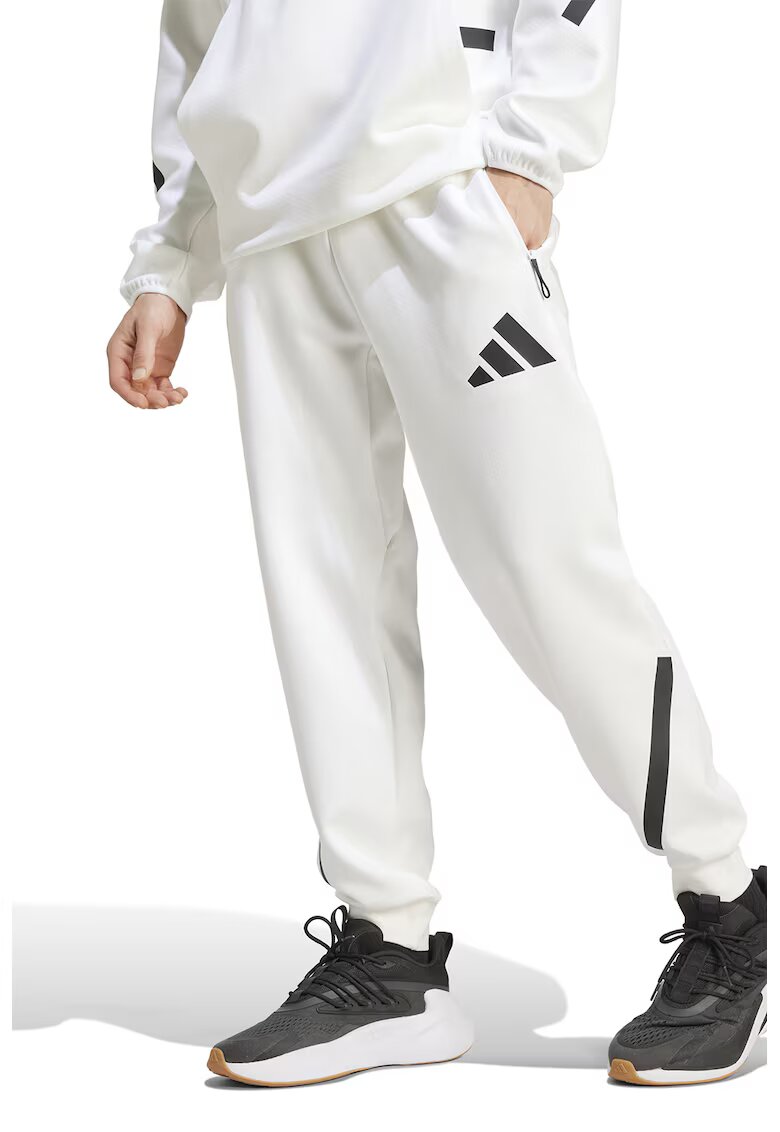 adidas Sportswear Pantaloni de trening relaxed fit cu snur Z.N.E. - Alb optic