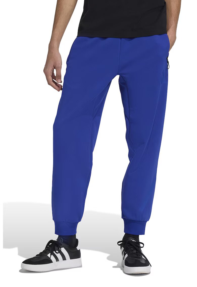 adidas Sportswear Pantaloni de trening relaxed fit cu snur Z.N.E. - Albastru royal