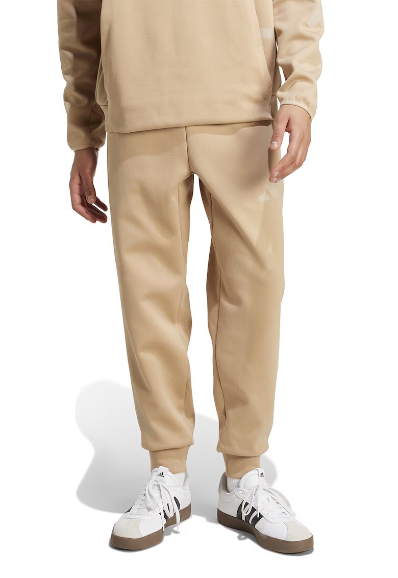 adidas Sportswear Pantaloni de trening relaxed fit cu snur Z.N.E. - Maro camel