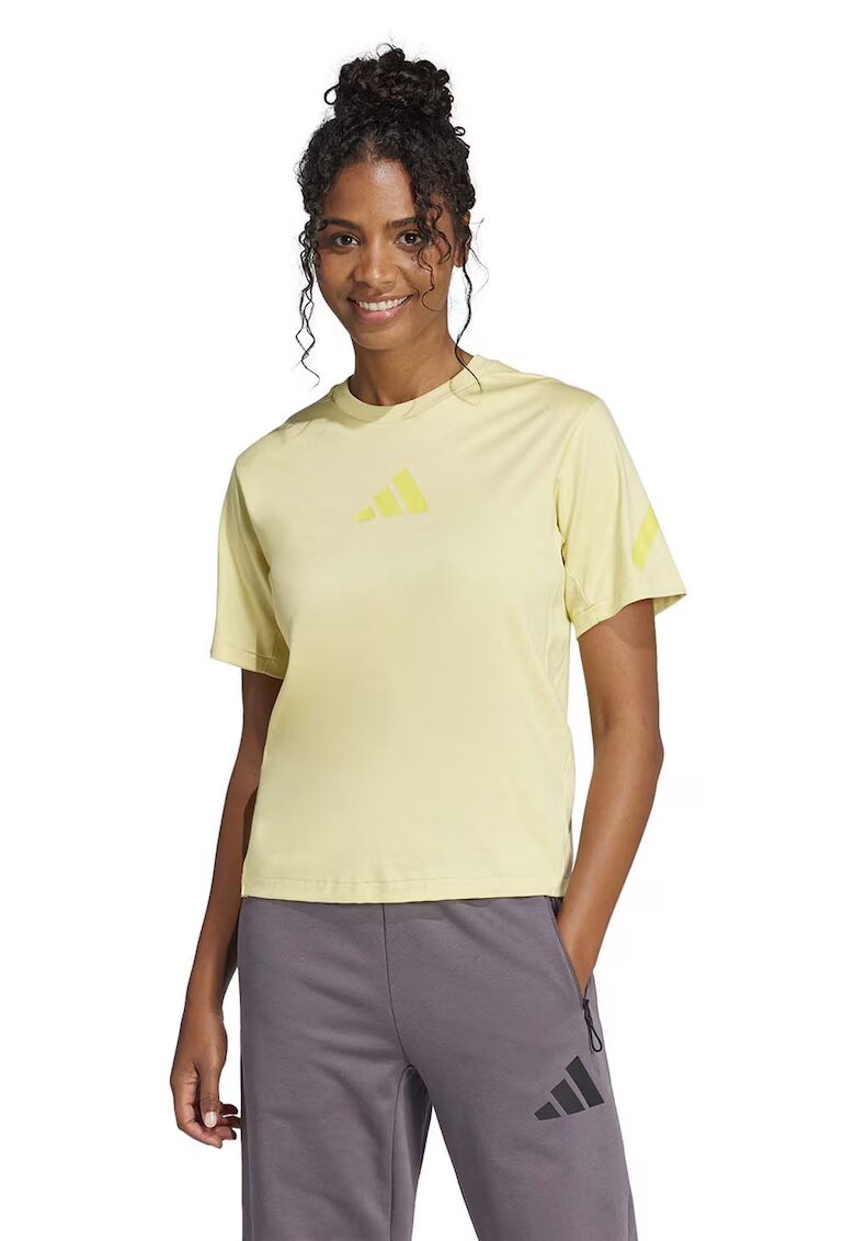 adidas Sportswear Tricou de bumbac cu imprimeu logo Z.N.E. - Galben pal