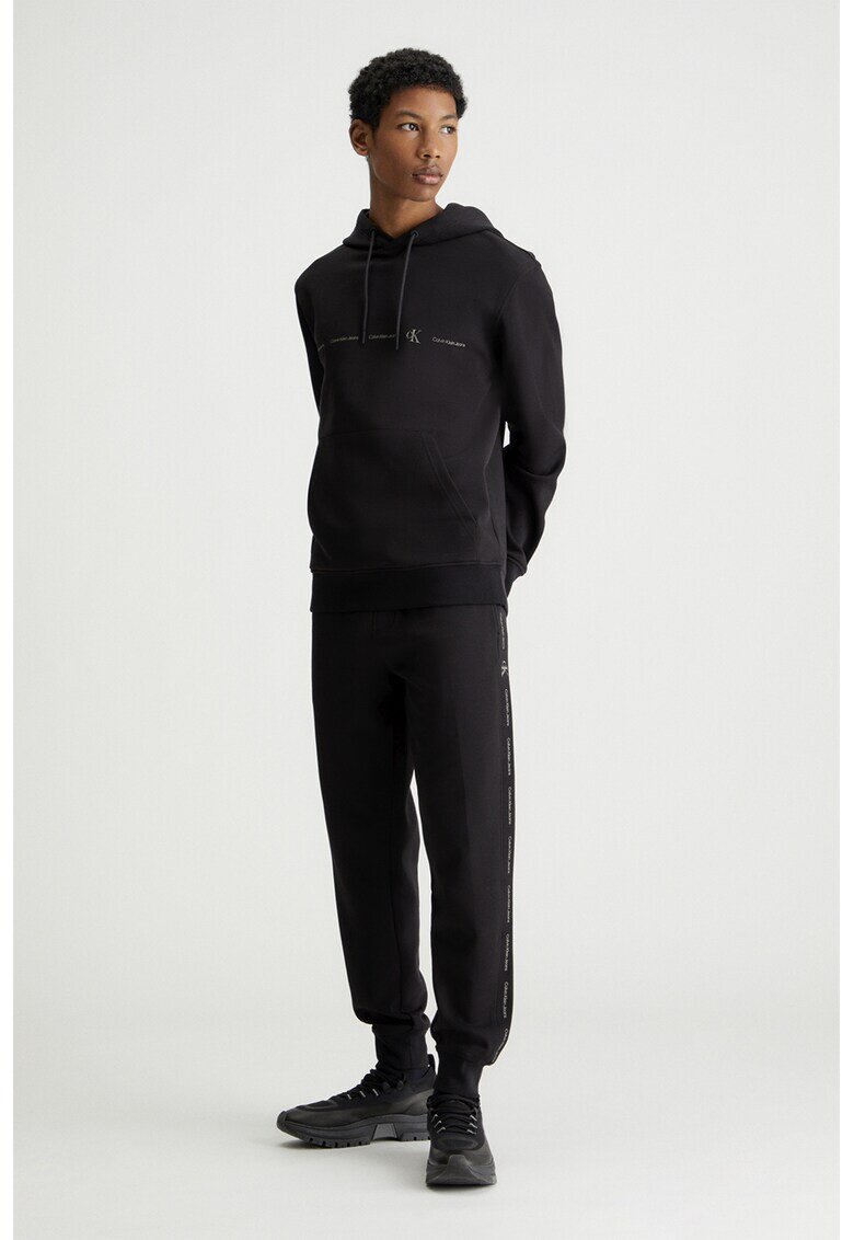 Calvin Klein Jeans Pantaloni de trening cu croiala conica si benzi laterale cu logo - Negru