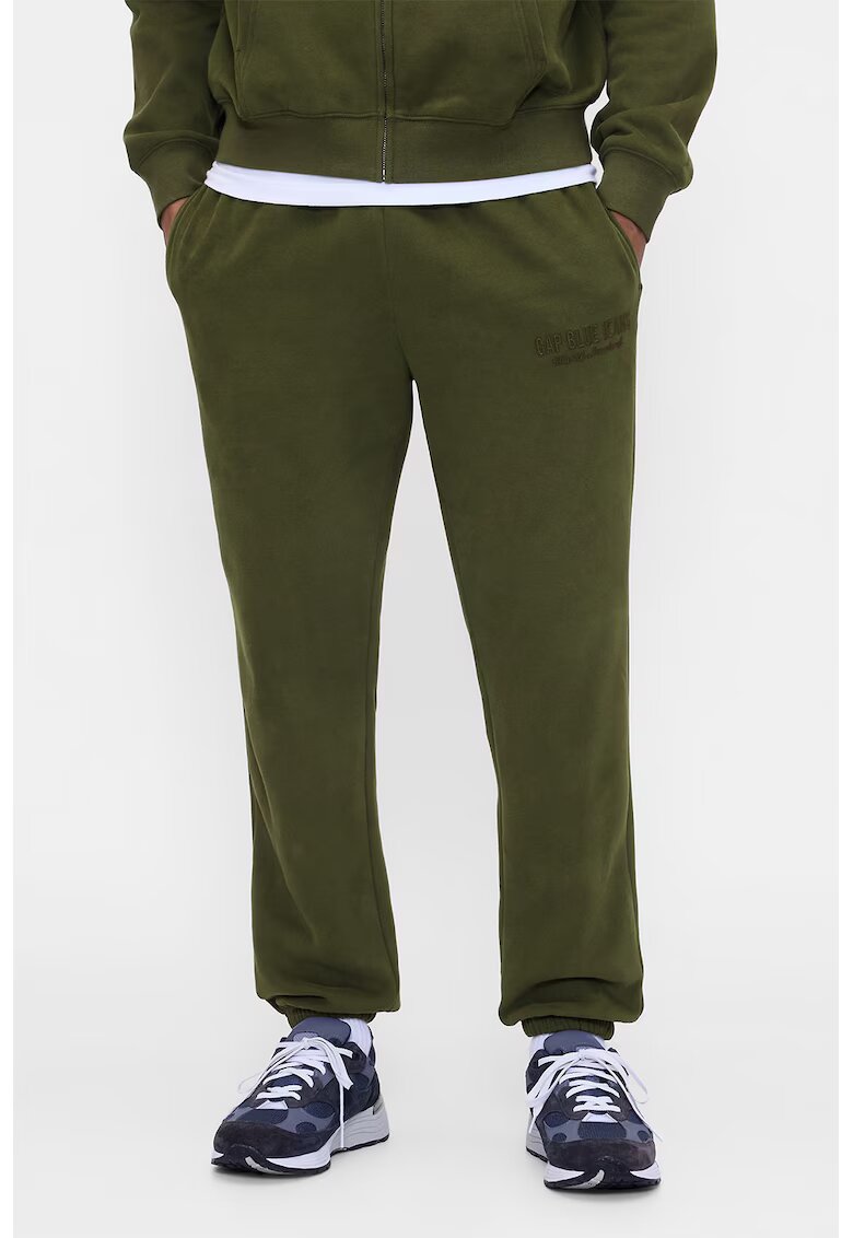 Gap Pantaloni de trening din bumbac cu buzunare laterale - Kaki pal