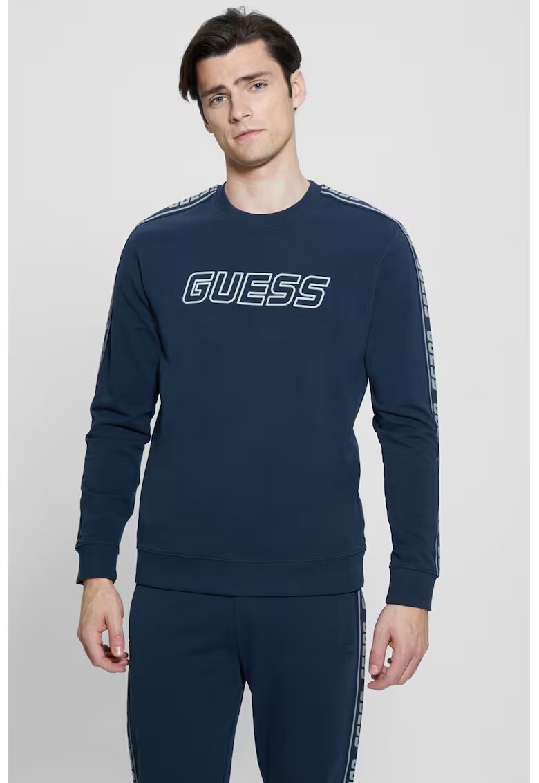 Guess Bluza de trening din bumbac cu segmente logo - Bleumarin