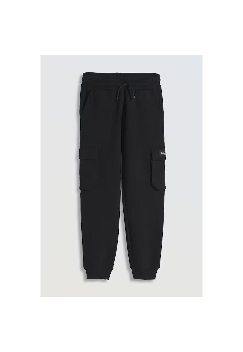R Pantaloni de tening din amestec din bumbac cu buzunae