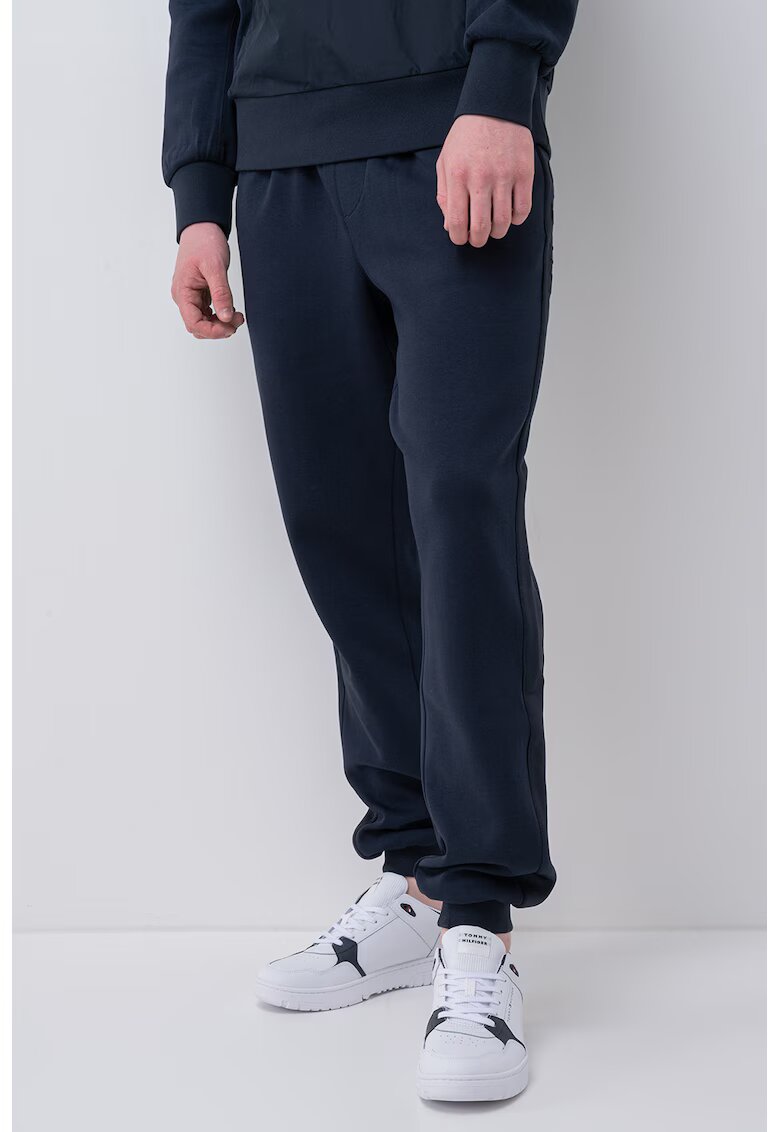 Tommy Hilfiger Pantaloni de trening regular fit cu snururi de ajustare - Bleumarin