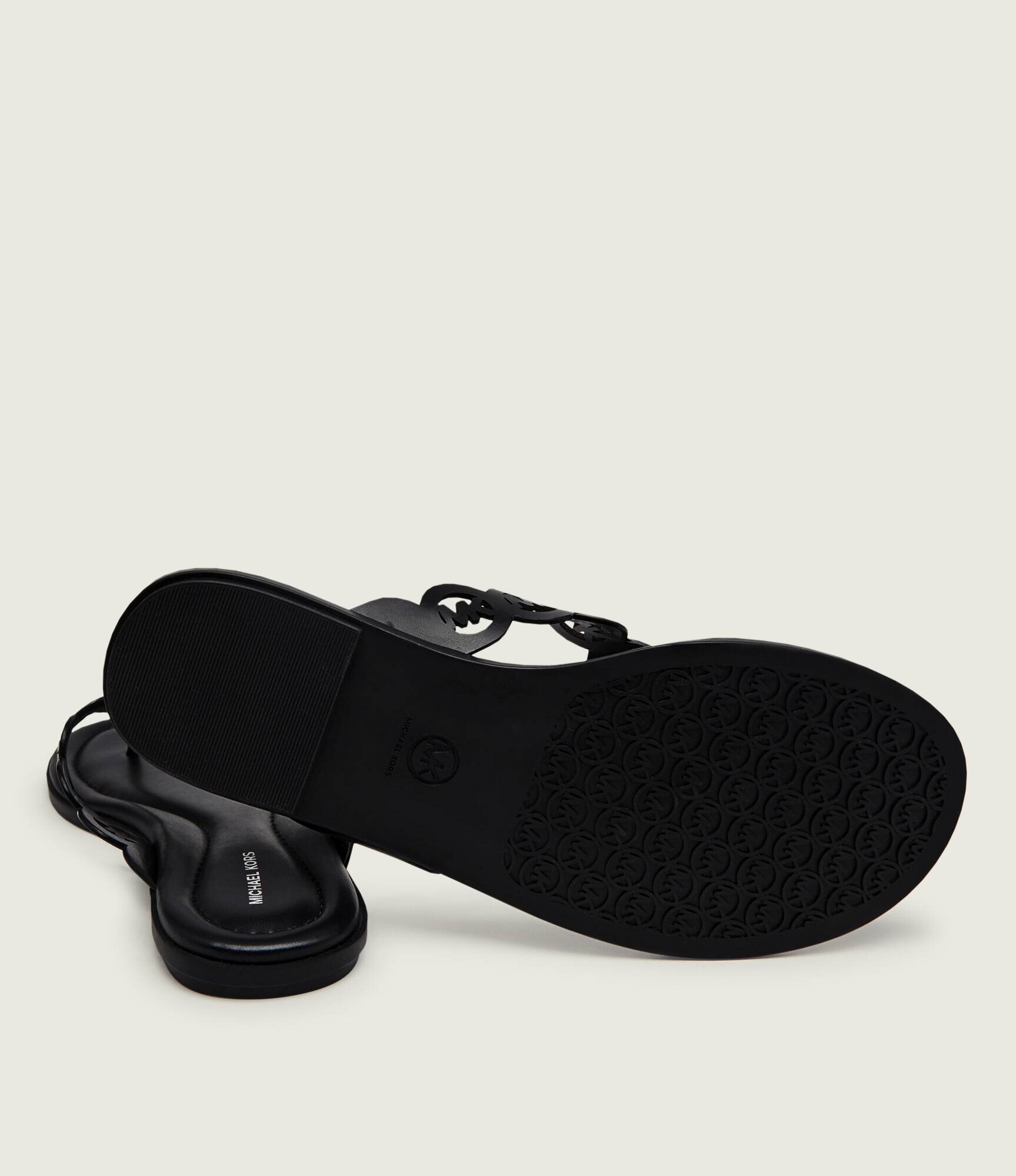 Michael Kors De piele flip flops Janie