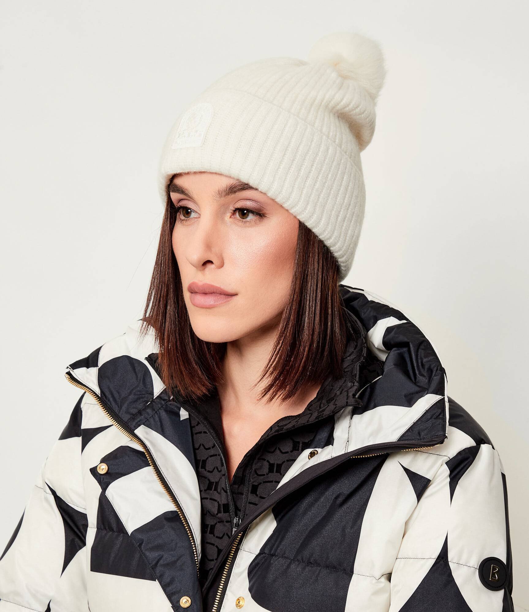 PARAJUMPERS De lână căciulă